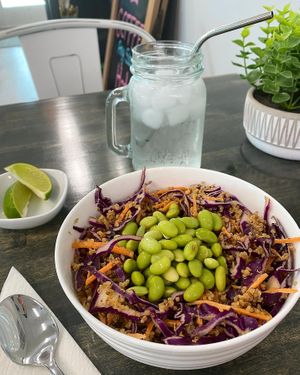 The Quinoa Thai Salad - quinoa, purple cabbage, carrot, edamame, cilantro and peanut sauce.  at Vibrant Beat Cafe in Fort Myers