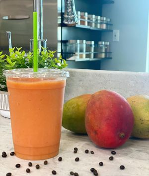 Our Papaya Punch Smoothie is a great way to cool down on these hot summer days! Made with papaya, mango, strawberries, turmeric and unsweetened orange juice. at Vibrant Beat Cafe in Fort Myers