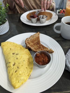 Vegan omelette, delicious, pick your own options, mushrooms, onions, bell peppers, smoked Gouda etc at Vibrant Beat Cafe in Fort Myers