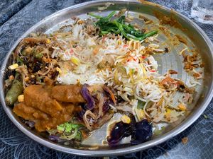Potato Curry, Pancit, pea greens, already eaten egg roll, falafel, and samosa    at Circle of Friends Restaurant in Findlay