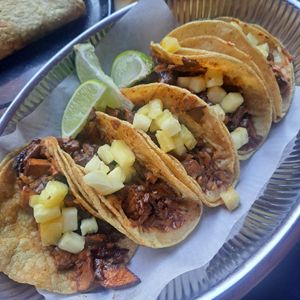 Mushroom and pineapple tacos at La Neta Bar in Stockholm