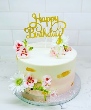 Floral pink and gold cake  at Austin Kind Cakes in Austin