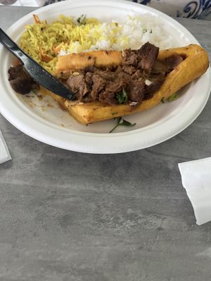 Canoas de platano con arroz basmati y jazmin  at La Familia in Mayaguez