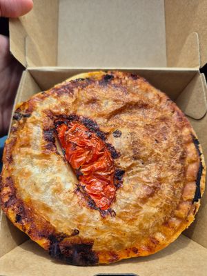 Italian ragu pie $8.50: quite good but taste mainly of tangy tomato at Greens Supermarket in Newtown