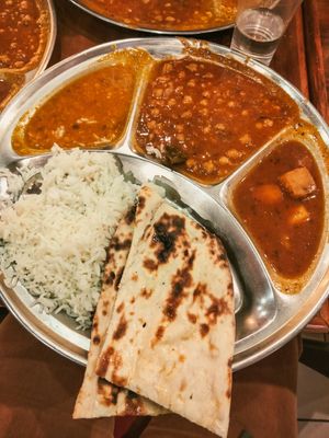 $8.50 all you can eat vegan curries with naan, lentil, chickpea and vegetable curries with naan. at Om Vegetarian - Wales Arcade in Melbourne
