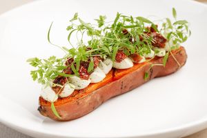 Baked sweet potato with tofu  at Gray Goose Garden in Chisinau