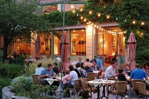 terrace at night at Auberge du Cèdre in Lauret