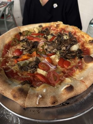 Veggie pizza but substitute vegan cheese   at Pigzza in Orlando