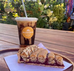 Vegan raspberry tart & Mayan chocolate  cold brew  at Plántate Cafe in Burbank