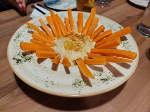 Starter / Hummus with carrot sticks at D'amira in Madrid