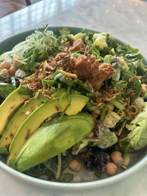 Build your own protein bowl; green base, vegan karagee chicken, broccoli, chickpeas, cucumber, green onion, crispy shallots, edamame in a spicy dressing  at Urban Food Market in Tangerang