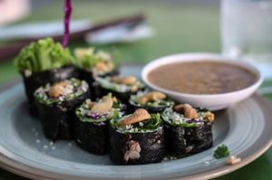 Nori vegetable rolls with peanut dipping sauce at May Kaidee's Vegetarian Restaurant - Samsen in Bangkok