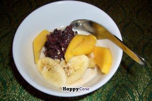 Dessert: black sticky rice in coconut milk with mango and banana at May Kaidee's Vegetarian Restaurant - Samsen in Bangkok