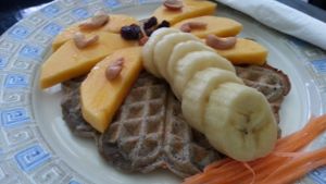 vegan waffle with fruit at May Kaidee's Vegetarian Restaurant - Samsen in Bangkok