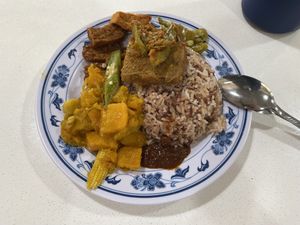 Tempeh/tofu, (vegan) assam fish, and pumpkin/corn  at Ren Xin Vegetarian - 仁心素食 in Northeast Singapore