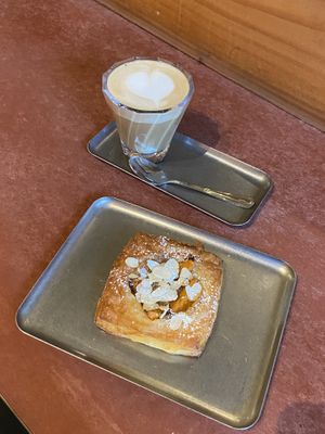 Oat cappuccino and vegan apricot danishh  at Stella Specialty Coffee Bar in Brussels