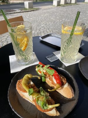 Open sandwiches and orange limo  at Riders.Coffee in Prague