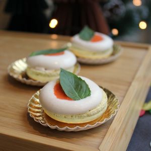 Savoury macaron - basil infused foam, roasted peper with espelette pepper at Les Macarons de Lorena in Brussels