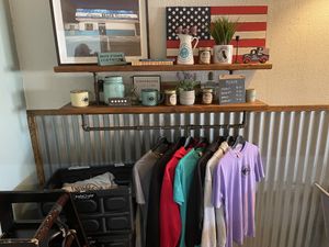 Cute merch 💜  at Atticus Cafe in Anaheim