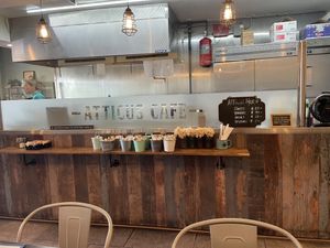 More inside, merch prices, utensils  at Atticus Cafe in Anaheim