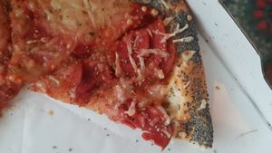 Vegan peperoni with poppy seed crust at Pizza'dam in Amsterdam