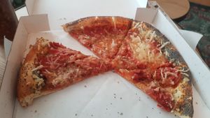 Vegan peperoni with poppy seed crust at Pizza'dam in Amsterdam