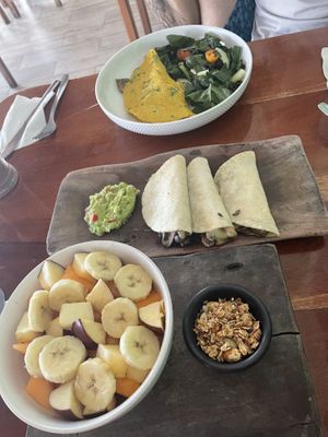 Fruit bowl, mushroom tacos, vegan omelette   at La Hoja Verde in Tulum