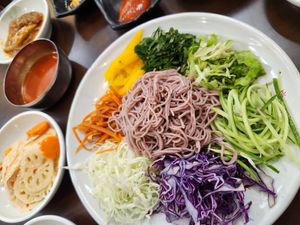 Dinner set menu with refillable banchan. Mixed noodle bibimmyeon at OBOK Veggie - Nhà hàng chay Hàn Quốc  in Hanoi