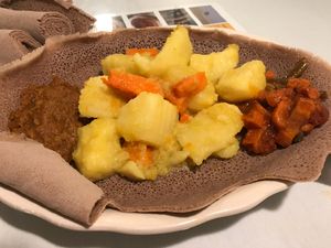 Potato and Carrot dish with injera (comes with 2 sides) at Abyssinia Ethopian Restaurant in Indianapolis