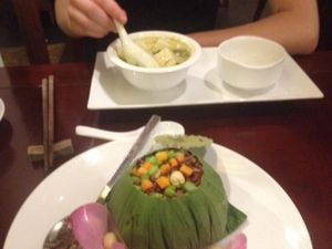 brown rice in lotus leaf and green curry at Hum Vegetarian - District 3 in Ho Chi Minh City