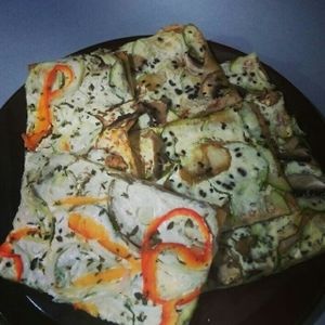 Vegan Pizza slices at Primo Basilico in Lisbon