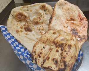 Assorted Naans (Kashmiri Naan, Garlic Naan & Lacha Paratha) at Zeera By The Bay in Pickering
