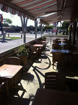 Patio seating at Zeera By The Bay in Pickering