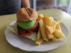 Burger with fries ($3) at Restaurante Vegetariano Zuvar in Puyo