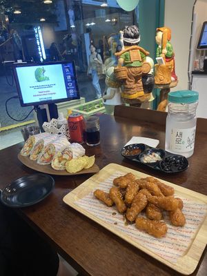 Table with side dishes and order tablet  at Vegan Kitchen - 비건 키친 in Seoul