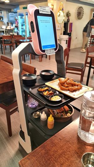 Robot serving food at Vegan Kitchen - 비건 키친 in Seoul