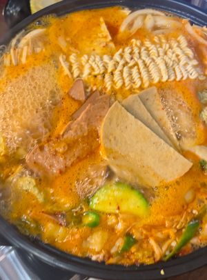 Budae Jjigae which is army soup when Korean people put all the sausages and hams from US army camps. It became one of Korea’s unique menu since then. All vegan of course, tasty!  at Vegan Kitchen - 비건 키친 in Seoul