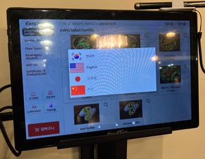 Menu is in 4 languages  at Vegan Kitchen - 비건 키친 in Seoul