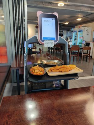 Robot server bringing the food at Vegan Kitchen - 비건 키친 in Seoul