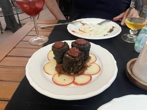 Fake blood sausage with apple slices at L'Espai in Tossa De Mar