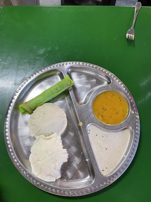 Idli with daal and coconut and a sweet appam roll  at G.V. Stall in Tanah Rata