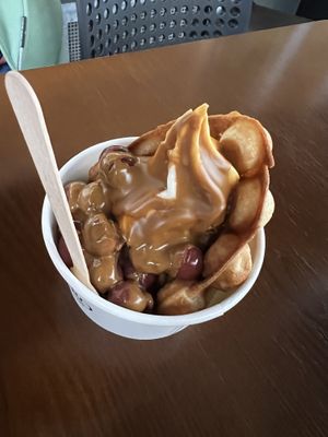 Waffle Cup with vegan frozen yoghurt, cherries and speculatius sauce   at YOMARO in Bonn