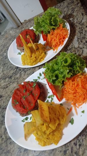Vegano do Chef : steak vegano com castanha de caju , castanha do Pará, nozes,grão de bico , girassol ,feijão fradinho.  Acompanha purê de banana da terra e salada at Espaço Brasil Itacaré-Bahia in Itacare