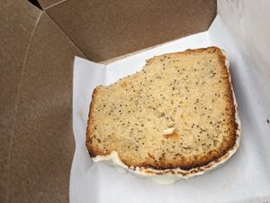 I had to take a bite. Lemon poppy seed. at Twelvemonth Bakehouse in Burlingame