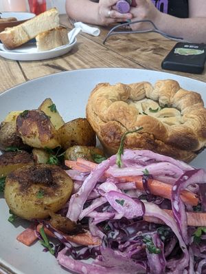 Pie with lemon potatoes and coleslaw at The Pie Box Cafe in Cardiff