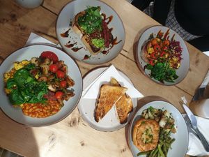 Avo Toast, sauerkraut toast, Vegan fry up and chicken &leak pie with lemons potatoes and garlic green beans. at The Pie Box Cafe in Cardiff