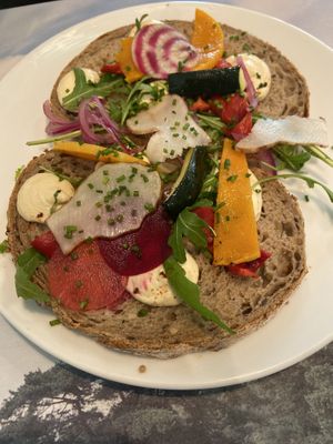 Sandwich with hummus and veggies from their own garden: tasty, bur small portion  at Parkrestaurant De Hoge Veluwe in Otterlo