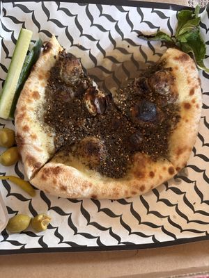 Za’atar mana’eesh (this is marked as vegan for online ordering but the labneh is not! Make sure to remove that)   at Baba's Hummus House Bakery in Minneapolis