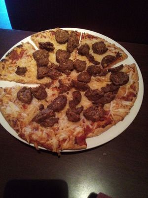 Cauliflower crust + vegan cheese + vegan meatballs!!! at Strings Italian Cafe in Yreka