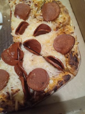 I bought vegan pepperoni and took it to them, unopened 🤤 this pizza is sooo good! at Strings Italian Cafe in Yreka